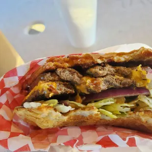 a sandwich with meat and lettuce