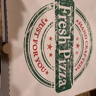 a pizza box with a logo on it
