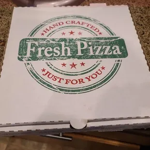 a box of fresh pizza