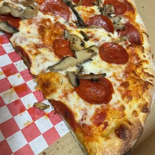 Thicker crust than NY style but so good &amp; crispy!