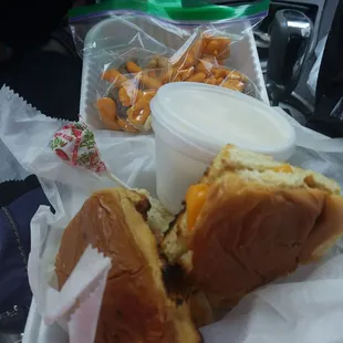 Kids grilled cheese with a lollipop goldfish animal crackers and ice cream on the side she knows how to do it up