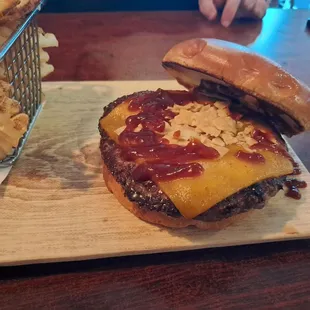 Toga burger with the nacho chips on it