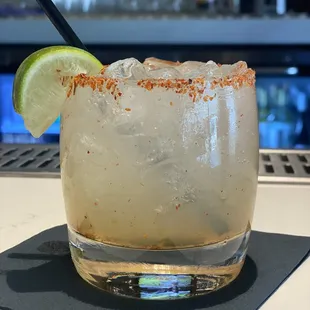 a margarita with a slice of lime
