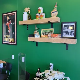 a dining room with green walls