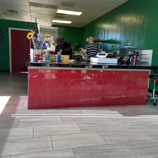 Inside- order at counter with 6 chairs to wait on order