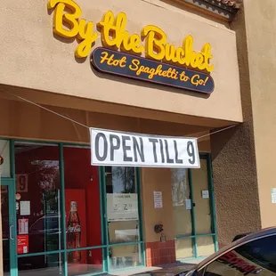 a car parked in front of a store