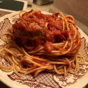Spaghetti with a meatball. (Plate not included)