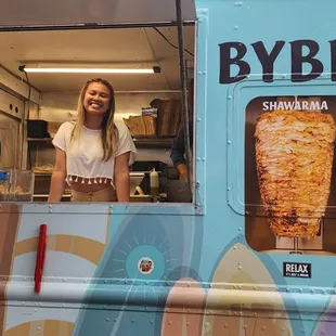 a woman behind the window