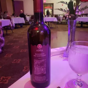 a bottle of wine on a table