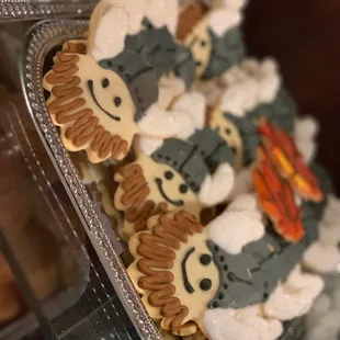 a tray of decorated cookies