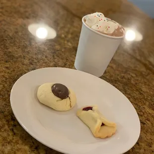 a plate of cookies and a cup of coffee