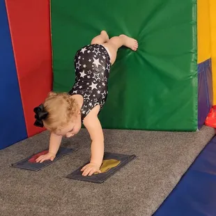 14 months old doing a handstand on the wall!