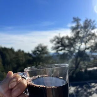 a person holding a glass of wine