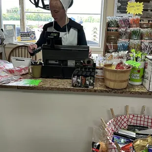 An Amish employee ringing me up