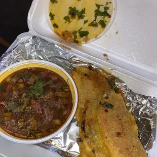 a meal in a styrofoam container