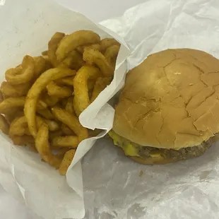 Cheeseburger and curly fries.