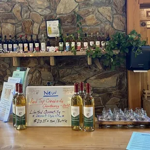 bottles of wine on a bar