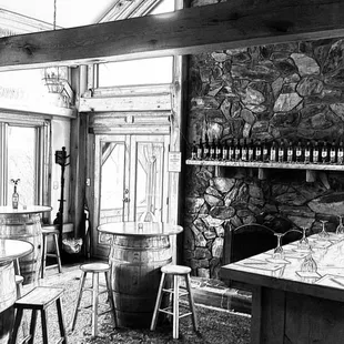 a black and white photo of a bar