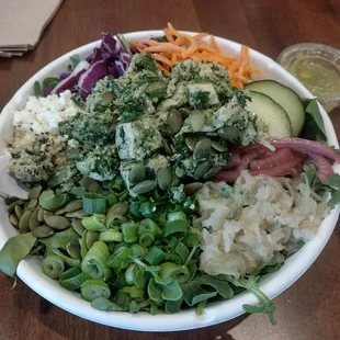 Byrd Detox salad with pesto chicken salad and lemon ginger dressing.