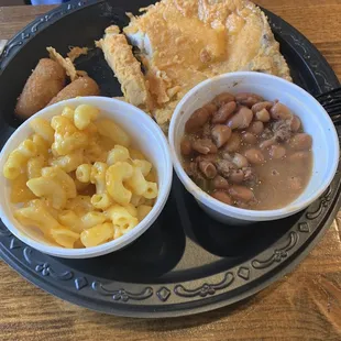 Fried Pork Chop Plate-sides are Mac n cheese and Pinto Beans