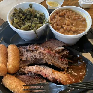 Beef Brisket Plate- sides are Baked Beans and Collards