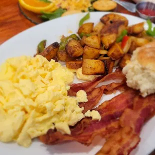 Egg with meat, side and bread of choice