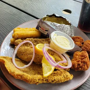 a plate of fried fish and fries