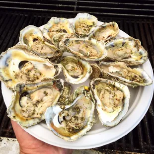 Fresh out of Little Bay, from Windmill Point Oyster Co. Lightly Roasted topped with Basil Pesto.