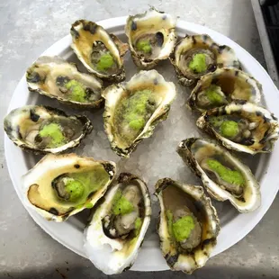 Fresh out of the water from Windmill Point Oyster Co. topped with our fresh made Jalapeño Sauce.