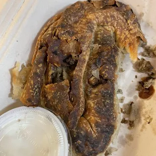 This was a beef byrek that I ordered to go. It was so burnt that I couldn&apos;t even eat it. Not worth the money!!