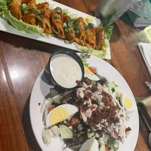 Won tons and half Cobb salad