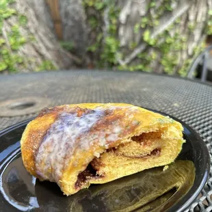 a half eaten pastry on a plate