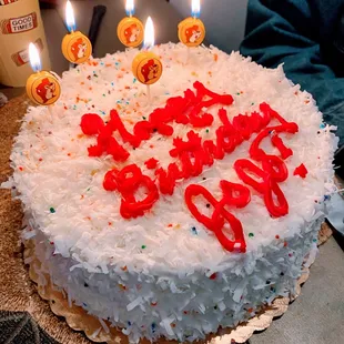 Coconut cream cake: WOW  (we added the candles) most delicious cake