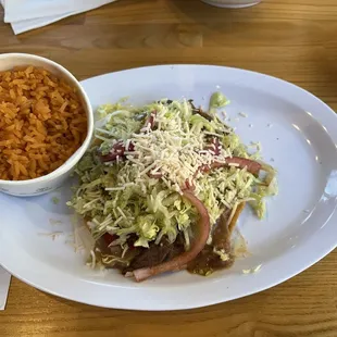 Guisada (plant based steak) tostada with rice
