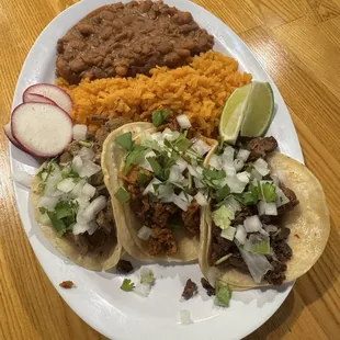 Taco plate with Al pastor, chikn and asada