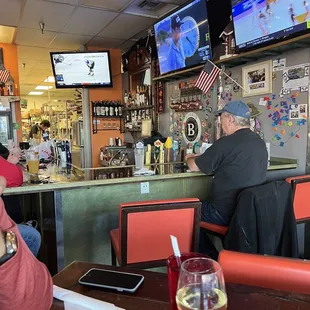 people sitting at the bar