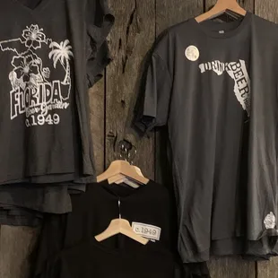  a variety of t - shirts on display