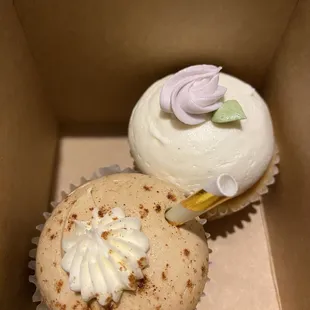 two cupcakes in a box