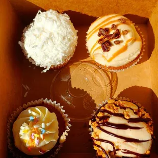Assorted cupcakes (Coconut cream, Bourbon Caramel, Snickers and Carrot Cake)