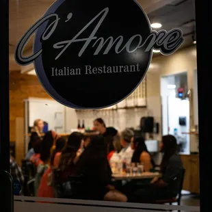 group of people sitting at a table