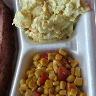 Potato salad with tinge of pickle juice flavor and corn with a snappy bite.