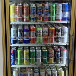 a refrigerator full of cans