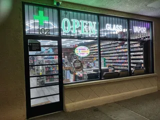 Pluto Smoke Shop