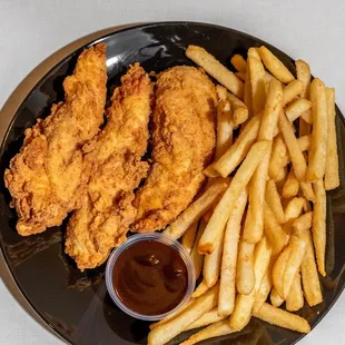 Crispy Chicken Tenders with our famous honey BBQ sauce made in house