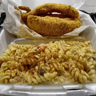 a hot dog and macaroni and cheese