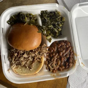 shows pulled pork sandwich, beans, and greens