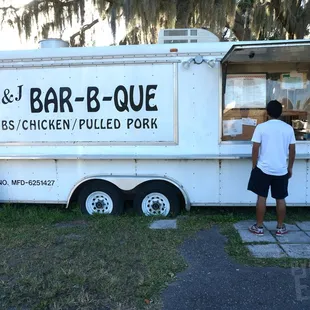 Regular, unassuming food truck. The smoker is outside at the very back of it