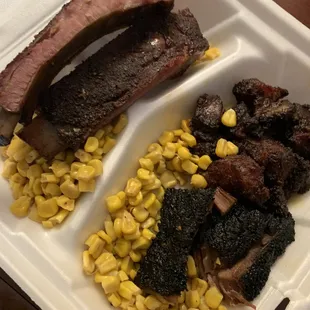 3 meat and side of canned corn