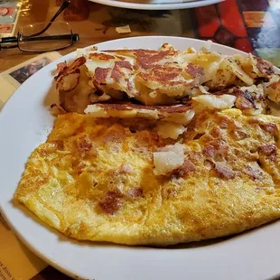 Ham &amp; cheese omelet with home fries...