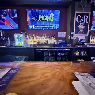 a bar with a wooden bar top